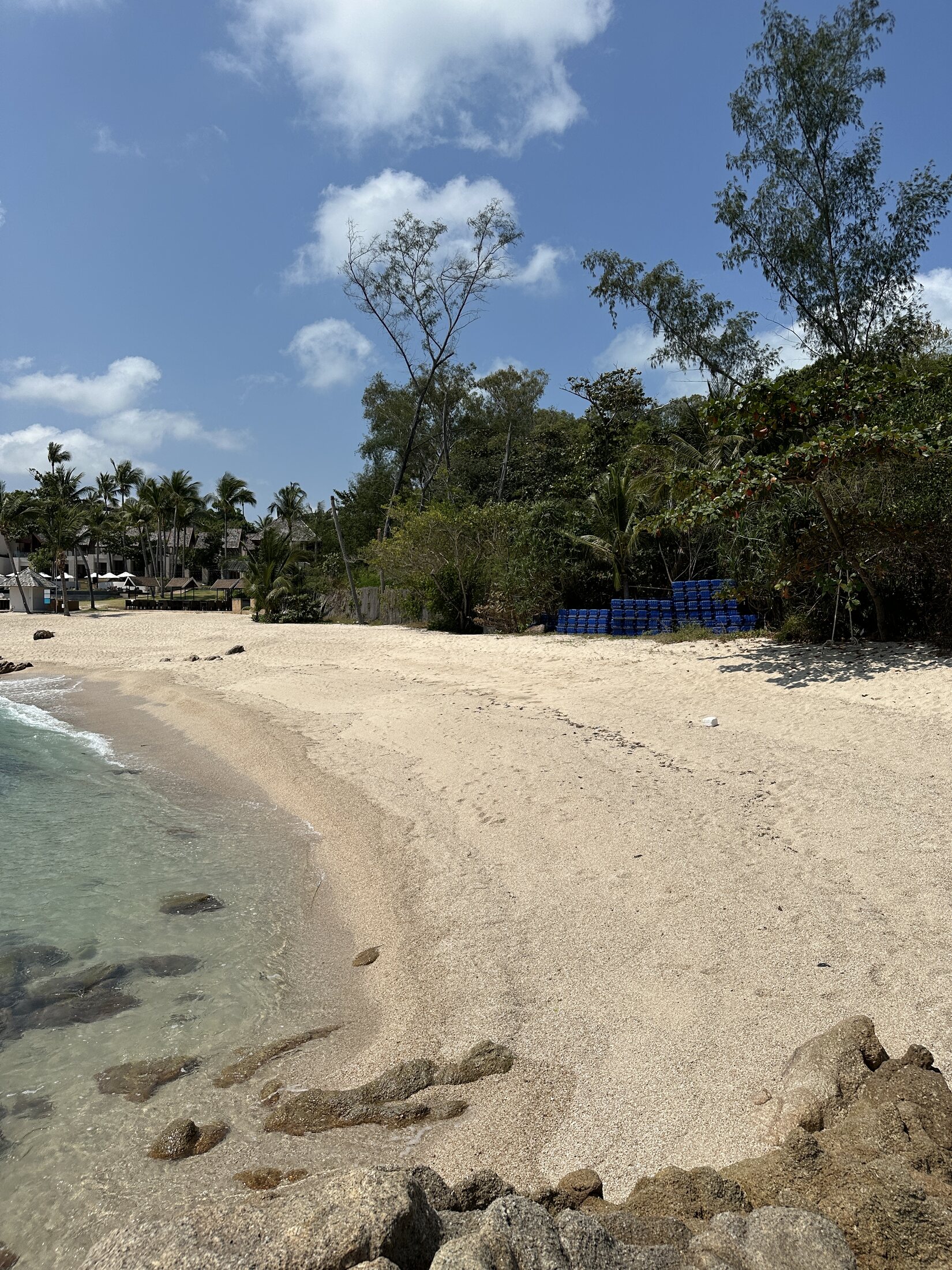 Beach at The Ritz-Carlton Koh Samui with visible maintenance detail