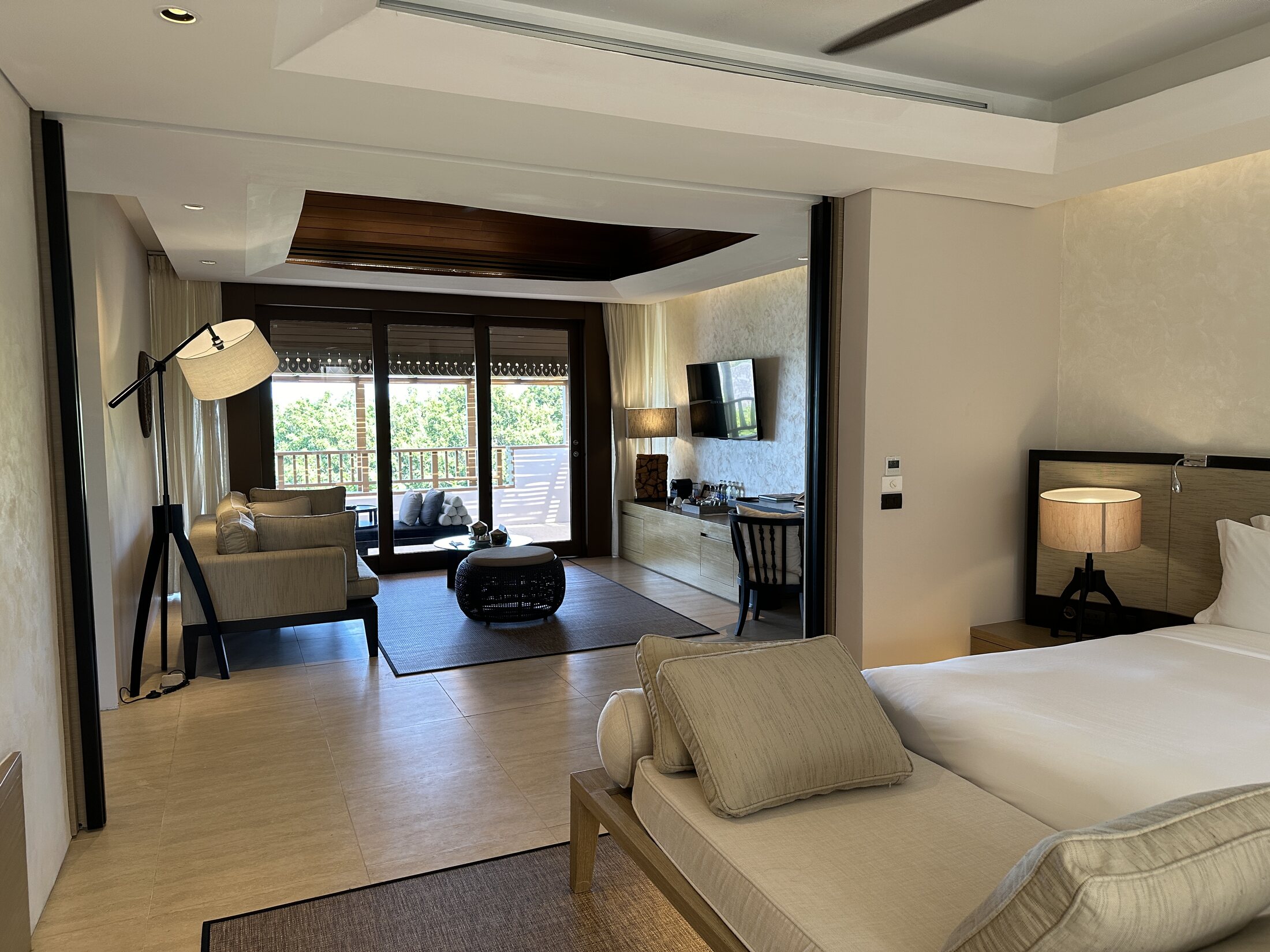 Essential Suite living and bedroom area at The Ritz-Carlton Koh Samui
