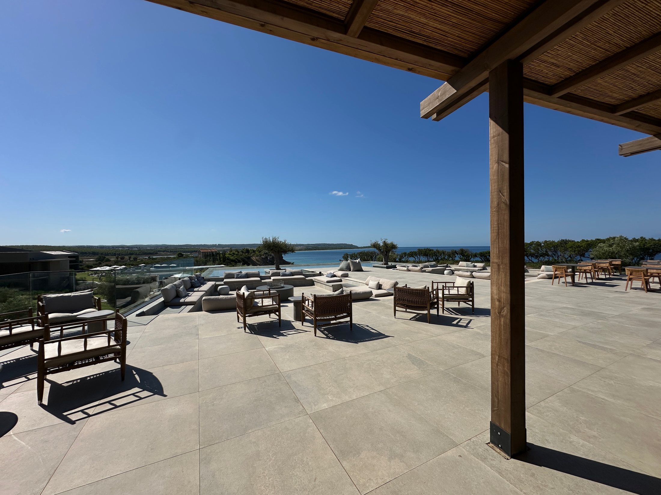 Outdoor lounge with Aegean Sea view at Zelia Halkidiki